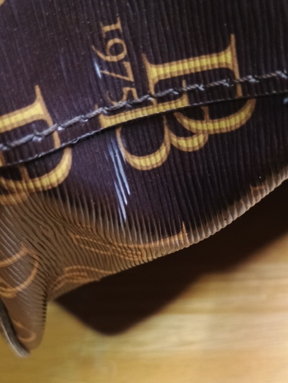 Dooney & Bourke Sutton Brown Logo Drawstring Bucket Bag with Red Interior - Picture 11 of 12